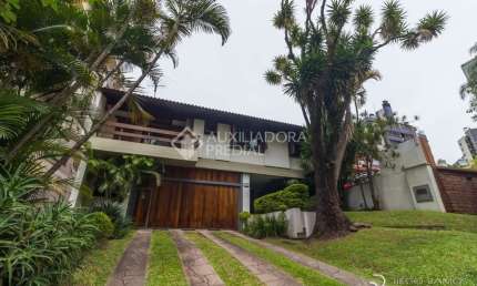 Casa em condomínio fechado com 4 quartos à venda na Rua Carlos Trein Filho, 1255, Auxiliadora, Porto Alegre, 440 m2 por R$ 3.990.000