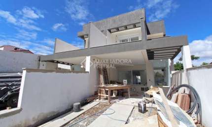 Casa com 3 quartos à venda na Rua Elízio Abate Crivella, 245, Jardim Itu Sabará, Porto Alegre, 150 m2 por R$ 849.000