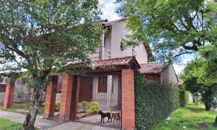 Casa com 3 quartos à venda na Rua Papa João Paulo II, 5, Jardim Algarve, Alvorada, 180 m2 por R$ 480.000