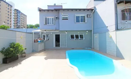 Casa com 4 quartos à venda na Rua Irene Capponi Santiago, 186, Cristo Redentor, Porto Alegre, 244 m2 por R$ 1.350.000