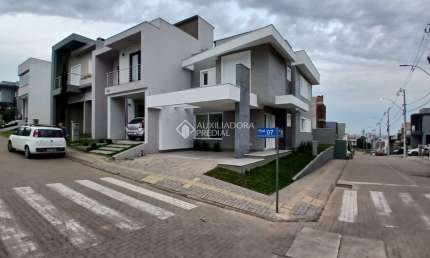 Casa em condomínio fechado com 3 quartos à venda na Rua Tancredo Neves, 990, Jansen, Gravataí, 140 m2 por R$ 898.990