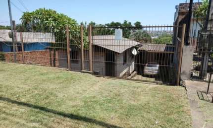 Terreno à venda na Avenida Tiradentes, 295, Aparecida, Alvorada, 420 m2 por R$ 350.000