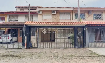 Casa com 3 quartos à venda na Rua Álvaro Domingues, 104, Parque Santa Fé, Porto Alegre, 91 m2 por R$ 450.000