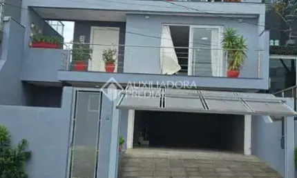 Casa em condomínio fechado com 4 quartos à venda na Rua Walter Porto Filho, 240, Mário Quintana, Porto Alegre, 284 m2 por R$ 895.000