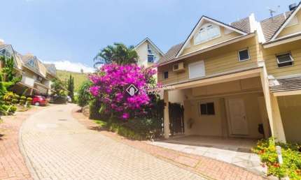 Casa em condomínio fechado com 3 quartos à venda na Avenida Engenheiro Ludolfo Boehl, 1179, Teresópolis, Porto Alegre, 216 m2 por R$ 999.000