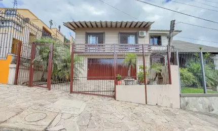 Casa em condomínio fechado com 3 quartos à venda na Rua Domingos Martins, 193, Cristo Redentor, Porto Alegre, 190 m2 por R$ 665.000
