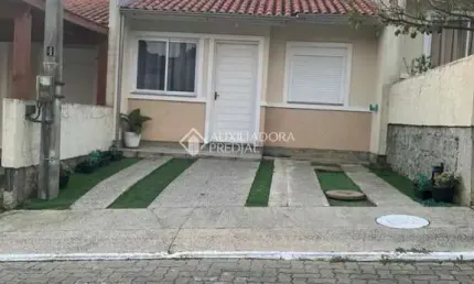 Casa em condomínio fechado com 2 quartos à venda na Rua Oscar Schick, 1911, Formoza, Alvorada, 66 m2 por R$ 230.000