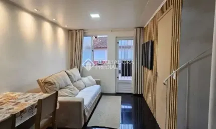 Casa em condomínio fechado com 2 quartos à venda na avenida joão ferreira jardim, 968, rubem berta, porto alegre, 59 m2 por r$ 212.000