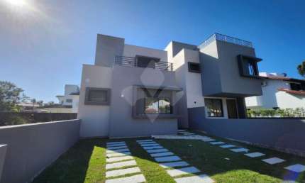Casa em condomínio fechado com 3 quartos à venda na José Custodio Pereira, 401, Centro, Garopaba por R$ 1.610.000