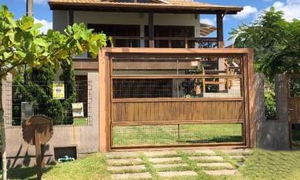 Casa em condomínio fechado com 3 quartos à venda na Rua Neri Inacio Silva, 232, Ferraz, Garopaba por R$ 2.200.000