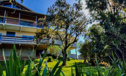 Casa em condomínio fechado com 4 quartos à venda na Ima 434, 1, Tamborete, Imaruí por R$ 1.600.000
