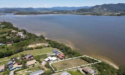 Terreno em condomínio fechado à venda na Ostra, Ibiraquera, Imbituba por R$ 2.000.000