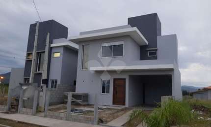 Casa em condomínio fechado com 2 quartos à venda na Projetada, 1, Campo D'una, Imbituba por R$ 675.000