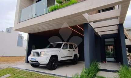Casa em condomínio fechado com 3 quartos à venda na Avenida Wilson Castelo Branco, 225, Deltaville, Biguaçu por R$ 1.295.000