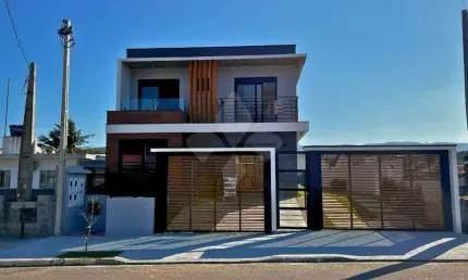 Casa em condomínio fechado com 3 quartos à venda na Enéas Faraco Guimarães, 10, Centro, Garopaba por R$ 1.110.000