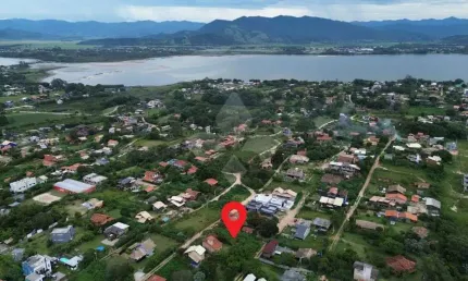 Terreno em condomínio fechado à venda na projetada, 2323, ibiraquera, imbituba por r$ 380.000