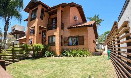 Casa em condomínio fechado com 4 quartos à venda na Rodovia Doutor Antônio Luiz Moura Gonzaga, 647, Rio Tavares, Florianópolis por R$ 4.500.000