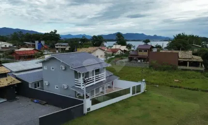 Casa em condomínio fechado com 3 quartos à venda na Beira Mar, 10, Ibiraquera, Imbituba por R$ 1.200.000