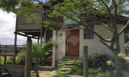 Casa em condomínio fechado com 4 quartos à venda na Central Do Rosa, 200, Ibiraquera, Imbituba por R$ 1.280.000