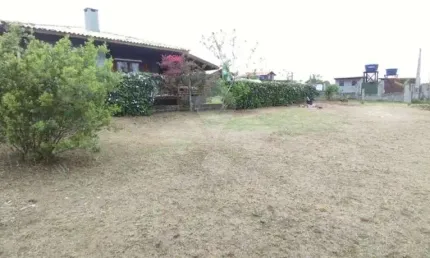 Terreno em condomínio fechado à venda na Projetada C, 26, Ibiraquera, Imbituba por R$ 350.000