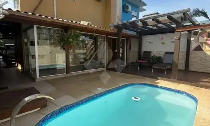 Casa em condomínio fechado com 3 quartos à venda na rua lajeado, 799, ambrósio, garopaba por r$ 990.000