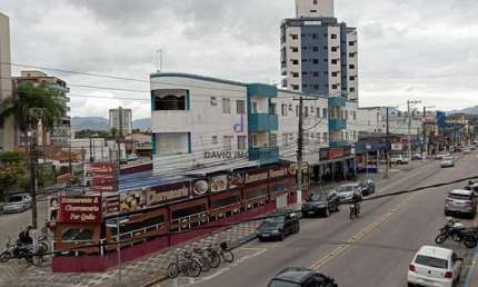Apartamento Centro, com dois dormitórios, sendo uma suíte, sem vaga de garagem.