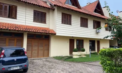 Casa em condomínio fechado com 3 quartos à venda na Luis Felipe Monmanny, 101, Espírito Santo, Porto Alegre por R$ 550.000
