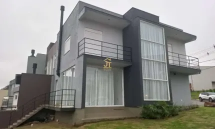 Casa em condomínio fechado com 3 quartos à venda na Rua Antônio Baggio, 100, Loteamento Jardim Timbaúva, Gravataí por R$ 850.000