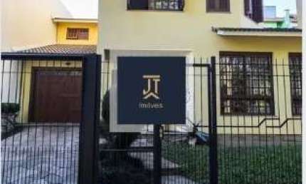 Casa com 4 quartos à venda na Rua Abdo Jorge Curi, 225, Parque Santa Fé, Porto Alegre por R$ 890.000