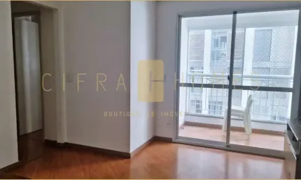 Apartamento de 50m² com sala ampla, varanda iluminada, 2 quartos e cozinha equipada.