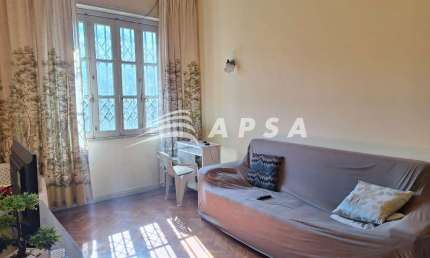 NO CORAÇÃO VIBRANTE DO CENTRO DO RIO, ESTE CHARMOSO APARTAMENTO MOBILIADO PARA ALUGUEL É A ESCOLHA P
