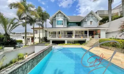Casa c/ 632,26m² no Condomínio São Paulo II em Cotia - SP, 4 suítes, piscina, gourmet, condomínio completo!
