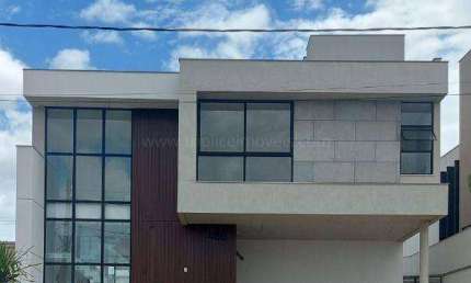 Casa 4 quartos de alto padrão com piscina e área gourmet privativos e vista para a represa no condomínio Alphaville.