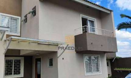 Sobrado com 3 dormitórios à venda, 164 m² por R$ 552.000 - Uberaba - Curitiba/PR