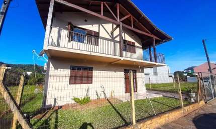 Casa com 6 dormitórios à venda, 284 m² por R$ 940.000,00 - Centro - Estância Velha/RS