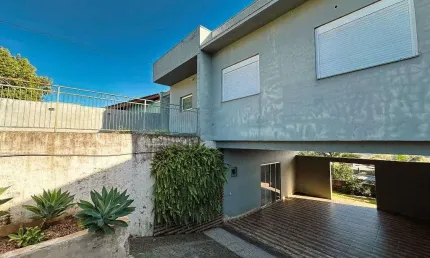 Casa com 3 dormitórios, 250 m² - venda por R$ 630.000,00 ou aluguel por R$ 3.063,00/mês - Encosta do Sol - Estância Velha/RS