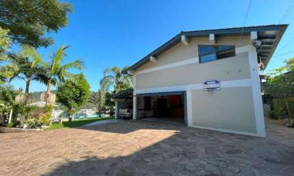 Casa com 4 dormitórios, 445 m² - venda por R$ 1.480.000,00 ou aluguel por R$ 7.990,00/mês - Floresta - Estância Velha/RS