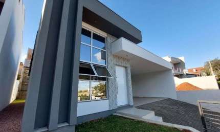 Casa com 3 dormitórios, 135 m² - venda por R$ 1.200.000,00 ou aluguel por R$ 5.153,00/mês - Solar do Campo - Campo Bom/RS