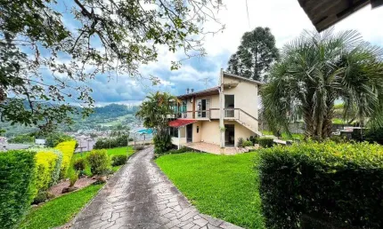 Casa com 2 dormitórios, 200 m² - venda por R$ 800.000,00 ou aluguel por R$ 3.685,00/mês - Floresta - Estância Velha/RS