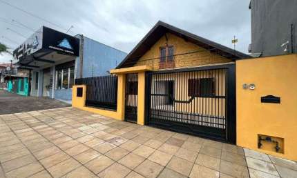 Casa com 3 dormitórios para alugar, 220 m² por R$ 5.500,00/mês - Rincão dos Ilhéus - Estância Velha/RS