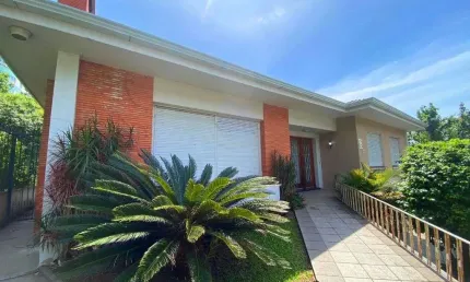 Casa com 4 dormitórios para alugar, 320 m² por R$ 7.775/mês - Centro - Novo Hamburgo/RS