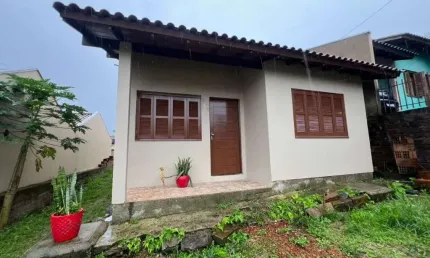Casa com 3 dormitórios para alugar, 65 m² por R$ 1.330,00/mês - Campo Grande - Estância Velha/RS