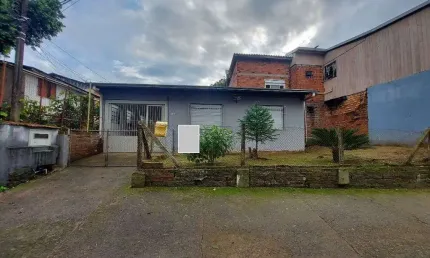 Casa com 3 dormitórios para alugar, 115 m² por R$ 1.950,00/mês - São Jorge - Novo Hamburgo/RS