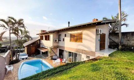 Casa com 4 dormitórios à venda, 248 m² por R$ 690.000,00 - Encosta do Sol - Estância Velha/RS
