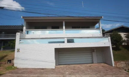 Casa com 4 dormitórios para alugar, 315 m² por R$ 4.540,00/mês - Ouro Branco - Novo Hamburgo/RS