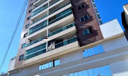 Apartamento novo  á venda na Praia do Morro em Guarapari Es próximo ao mar fino acabamento e facilitado com a construtora composto de 2 quartos  suíte