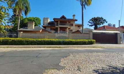 Casa com 4 quartos à venda na Rua Paissandu, 361, Partenon, Porto Alegre