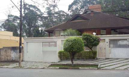 CASA TÉRREA A VENDA NO TREMEMBÉ - 4 SUÍTES E 10 VAGAS DE GARAGEM
