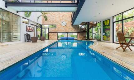 CASA Á VENDA COM 4 QUARTOS, PISCINA AQUECIDA, ESPAÇO GOURMET NO CITY BOAÇAVA.