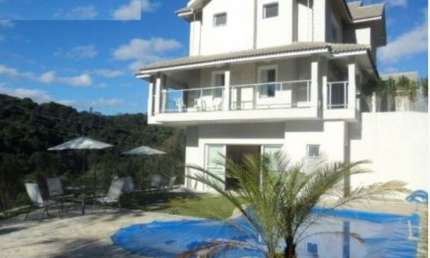 Casa na Serra da Cantareira em Condomínio Fechado  Casa com 500 m² de área construída 1.010 metros de  terreno com 4 quartos 3 suítes piscina espaço gourmet salão de festas casa de altíssimo padrão!